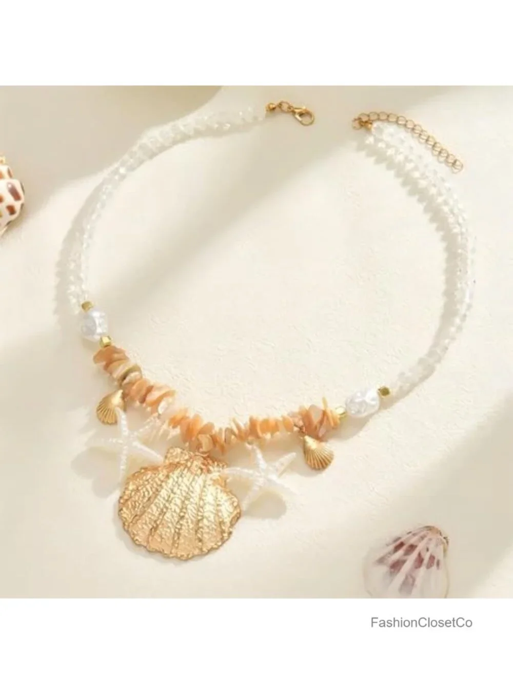N/A gold seashell
